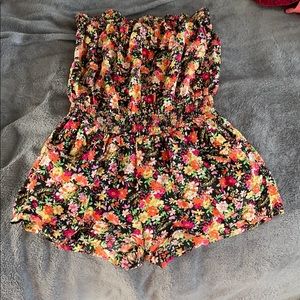 romper with front and back pockets.